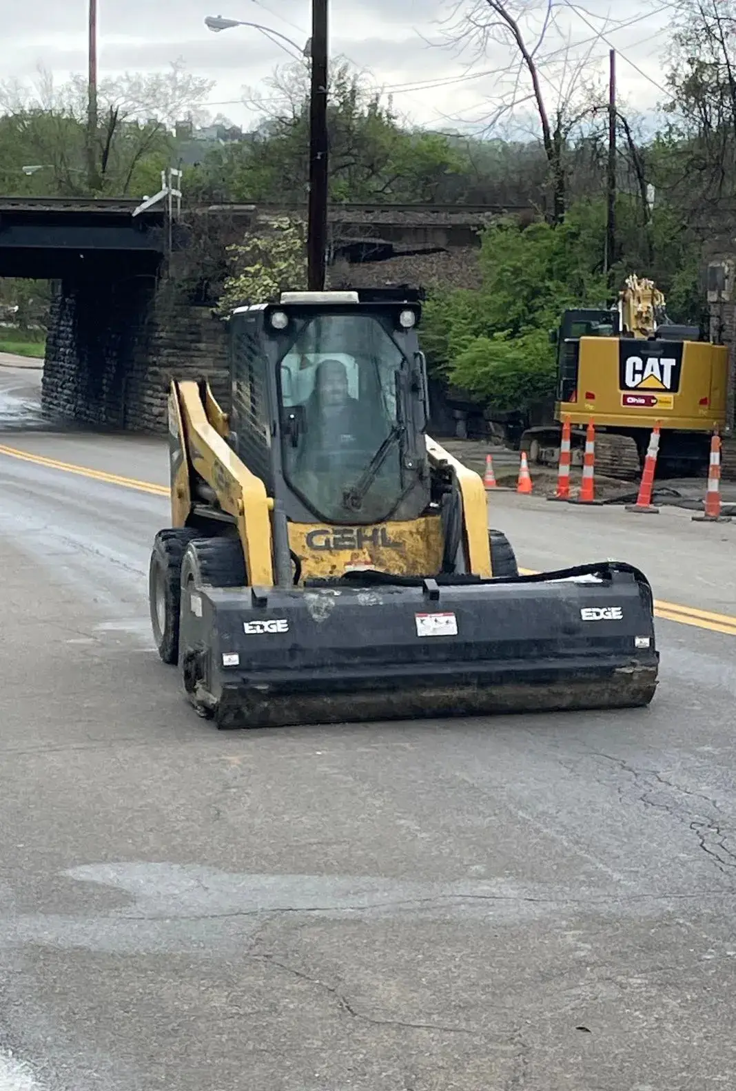 Skid steer working a residential site