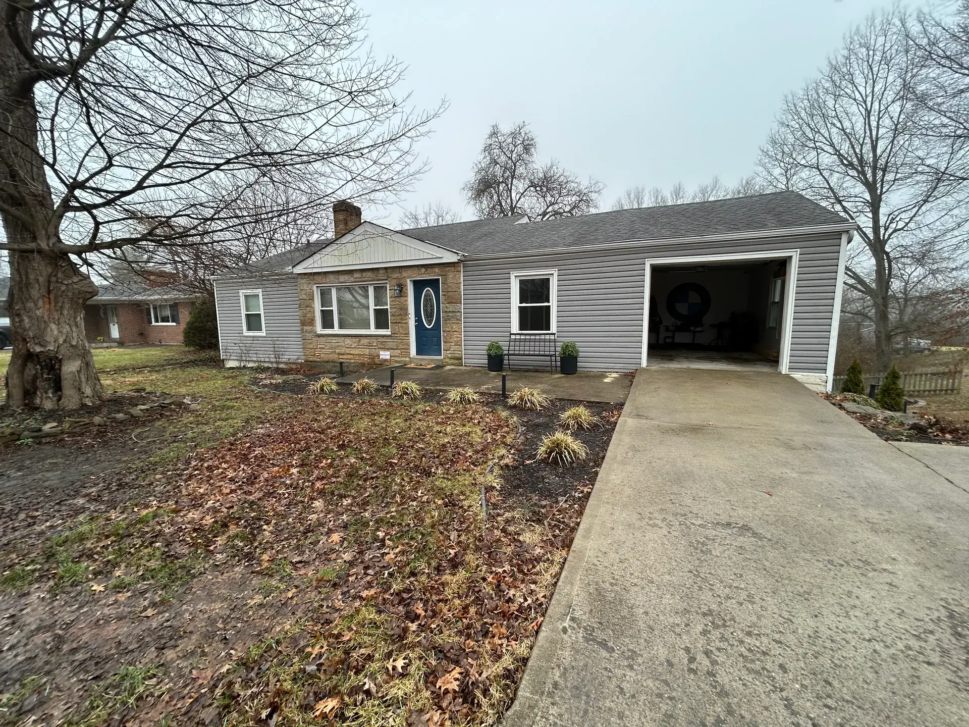 Front porch addition and new siding, before
